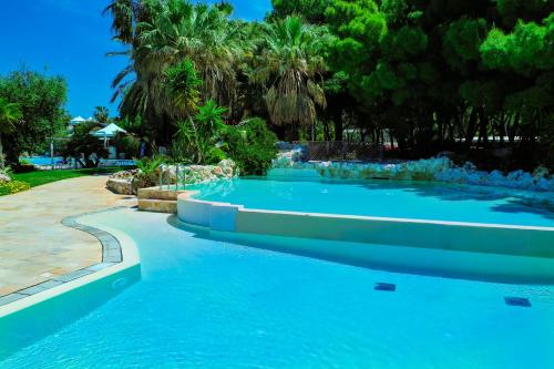 Πισίνα στο ή κοντά στο Villaggio Giardini D'Oriente