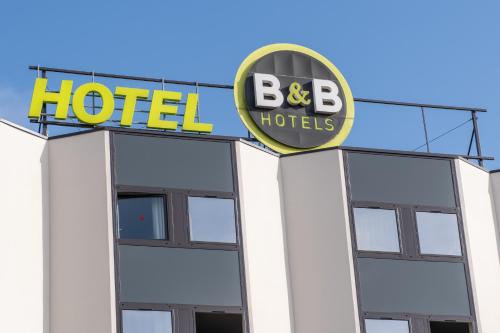 a hotel sign on top of a building at B&B HOTEL Toulouse Centre Canal du Midi in Toulouse