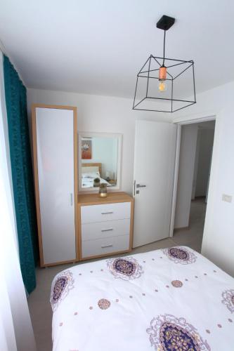 Katil atau katil-katil dalam bilik di Apartament Delora View