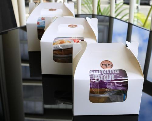 two vending machines with food inside of them at Toowong Central Motel Apartments in Brisbane