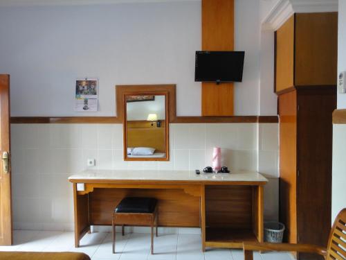 TV a/nebo společenská místnost v ubytování Hotel Sorga Cottages
