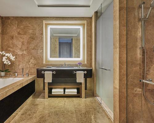 a bathroom with a sink and a mirror at Four Seasons Hotel Casablanca in Casablanca