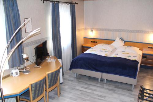 Hotel Restaurant Post Italia tesisinde bir odada yatak veya yataklar