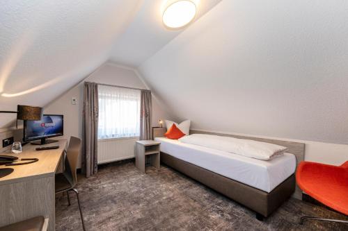 Postel nebo postele na pokoji v ubytování Hotel Alte Bäckerei