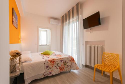 Katil atau katil-katil dalam bilik di Nel Conero Affittacamere