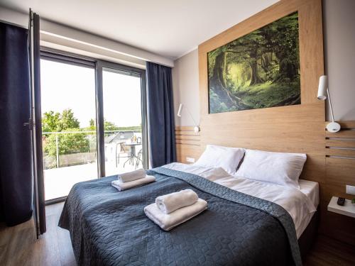 Кровать или кровати в номере Hotel Panorama