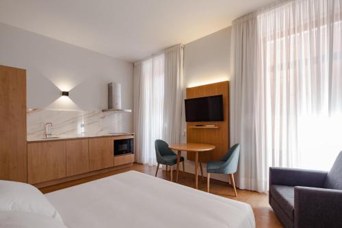 Postel nebo postele na pokoji v ubytování Uma Formosa Apartments