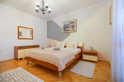 Posteľ alebo postele v izbe v ubytovaní Apartment Jardin with free cowered parking