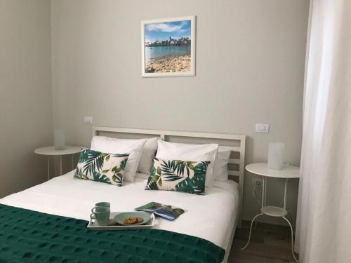 Кровать или кровати в номере Harrys Palm Puerto de Mogán