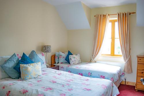 Giường trong phòng chung tại no 4 Cnoc Na Si Dublin Road