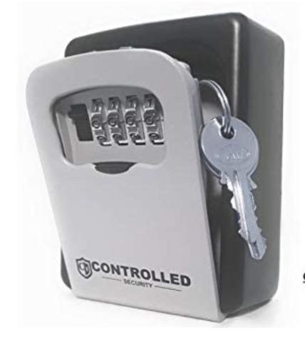 a small white container with a key in it at Windsor house in Stranraer