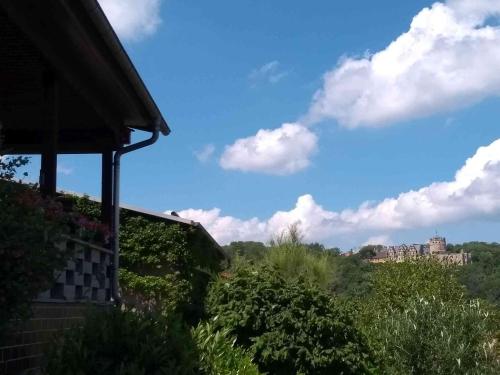 a view from a house with a building in the background at Appartement Studio Kremser in Kranichfeld