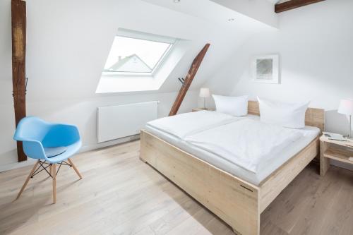 Postel nebo postele na pokoji v ubytování Strandloft Zwei Norderney