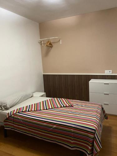 Cama o camas de una habitación en hostal urpi-oklahoma