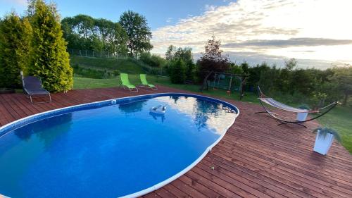 Bazén v ubytování Agroturystyka Siedlisko pod dębami nebo v jeho okolí