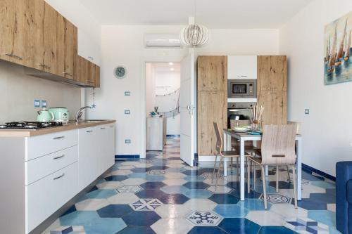 A kitchen or kitchenette at A casa di Monachella
