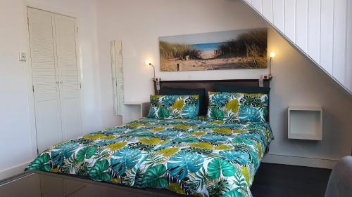 Postel nebo postele na pokoji v ubytování Guesthouse Zandvoort