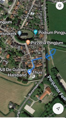 a map of a city with pointers to different places at B&B De Gulden Halsband Pingjum in Pingjum