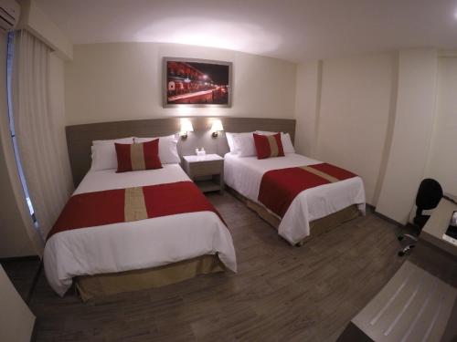 
Cama o camas de una habitación en Hotel Mansur Business & Leisure
