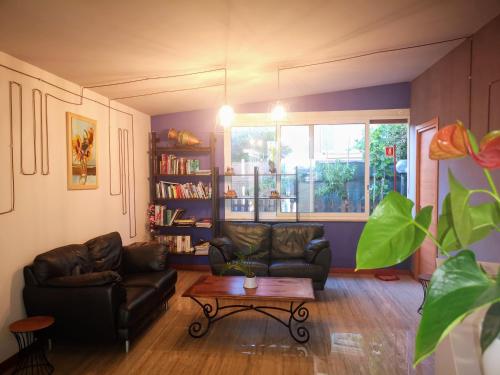 a living room with a couch and a coffee table at Hotel Bellavista in Lido di Ostia