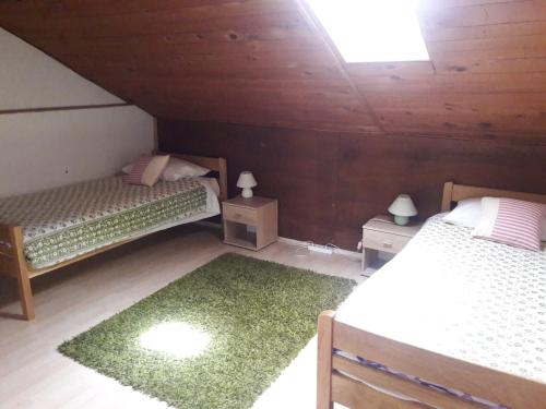 Postel nebo postele na pokoji v ubytování Apartmani Dominik