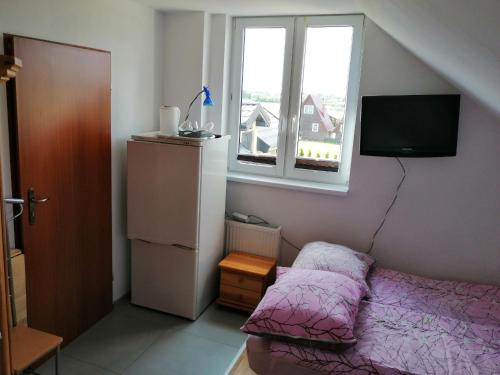 Postel nebo postele na pokoji v ubytování Baltic-House