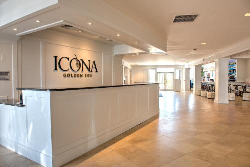 a lobby of a store with a reception counter at ICONA Avalon in Avalon