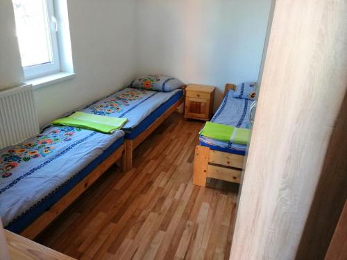 Un pat sau paturi într-o cameră la Baltic-House