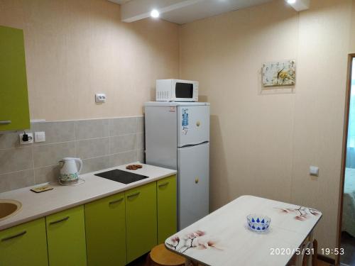 Кухня или мини-кухня в Apartment in Dzhemete 