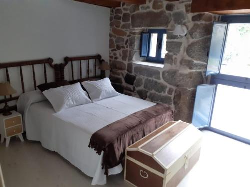Ένα ή περισσότερα κρεβάτια σε δωμάτιο στο Vila Morena