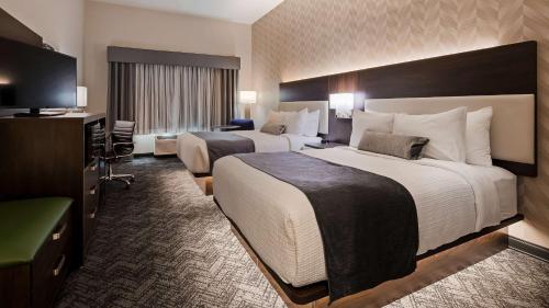 Postel nebo postele na pokoji v ubytování Best Western Plus Parkside Inn & Suites