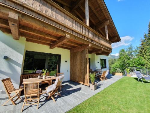 Κήπος έξω από το Zeitfrei Chalet Apartments