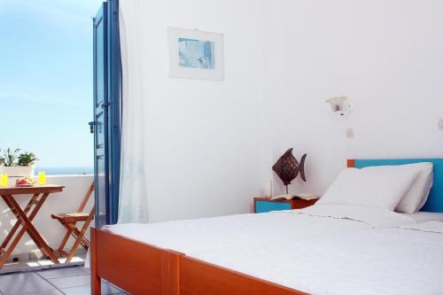 Postel nebo postele na pokoji v ubytování Hotel Kalma