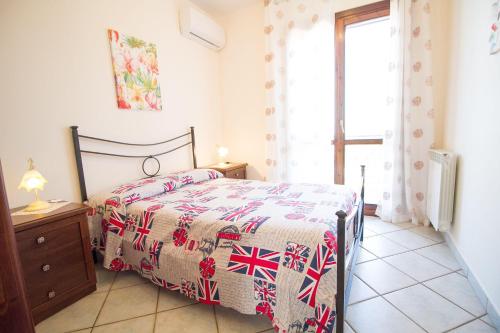 Postel nebo postele na pokoji v ubytování Etna-Villa-Alba-Chiara