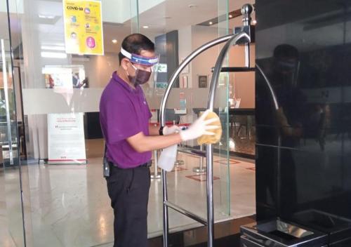 a man wearing a face mask at Swiss-Belinn Tunjungan Surabaya in Surabaya