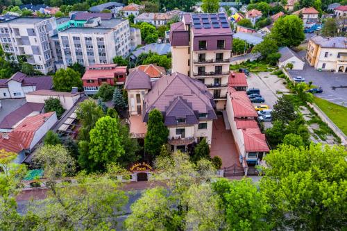 an aerial view of a city with buildings at Hotel Golden House in Craiova