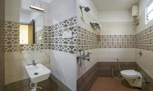 Koupelna v ubytování Ratna Resort near Bhubaneswar Airport
