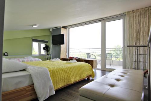 Postel nebo postele na pokoji v ubytování Nzeb Villa