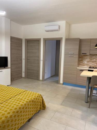 Televízia a/alebo spoločenská miestnosť v ubytovaní Casa sul mare