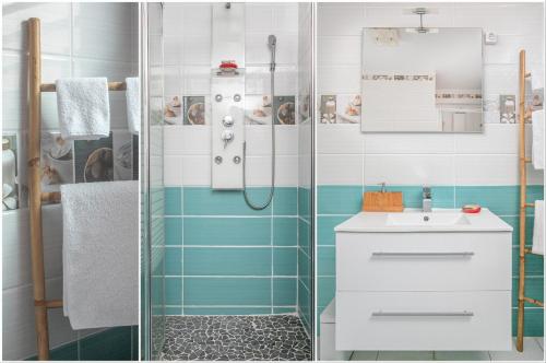 Koupelna v ubytování Le Brin d'Amour Apartment