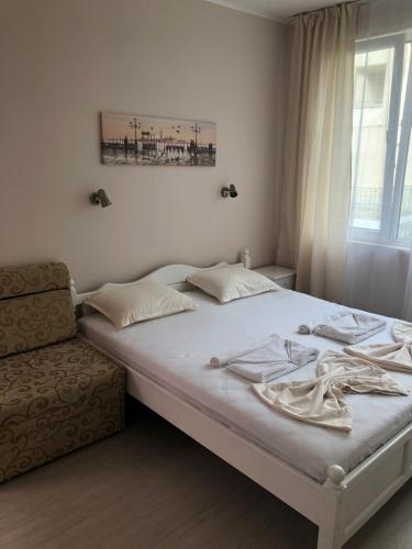 Postel nebo postele na pokoji v ubytování Guest rooms Luxor