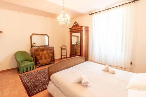 Postel nebo postele na pokoji v ubytování Castello di Crocicchio