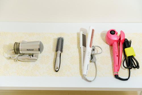 a white counter with some items on it at Osaka Yeon House in Osaka