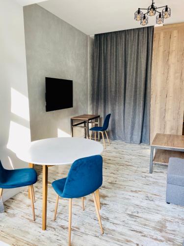 Μια τηλεόραση ή/και κέντρο ψυχαγωγίας στο MAGNIT Apartments у самого моря