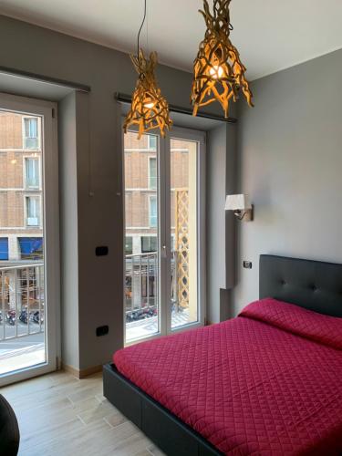 Postel nebo postele na pokoji v ubytování MARCONI 2 rooms