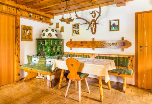 a dining room with a table and chairs at Tonibauer in Tamsweg