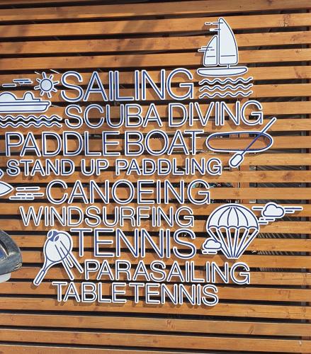 a sign on a wall that says sailing scuba diving paddleboard paddling standing at NEW!!! 2024 MAREA apartments with XXL Sunny Terrace in Poreč