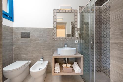 Ένα μπάνιο στο Fior di Lino Rooms