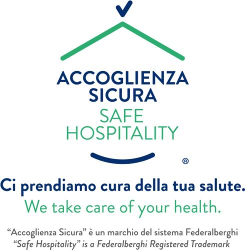 a sign that reads acociacionigma sigma safe hospitalify at B&B La Maison D' Amelie Camere e Appartamenti in Fenis