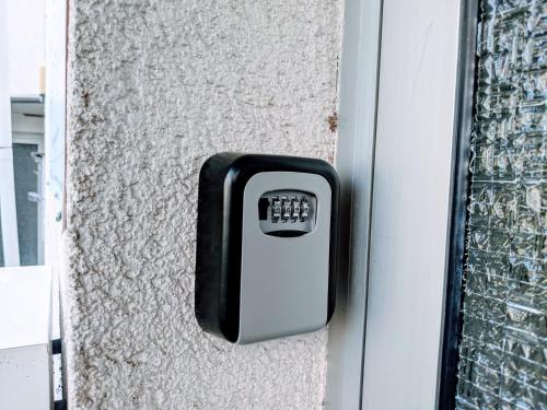 a black and white door handle on a building at LENASTAY l Tiny Apartment in Top Location in Kaiserslautern